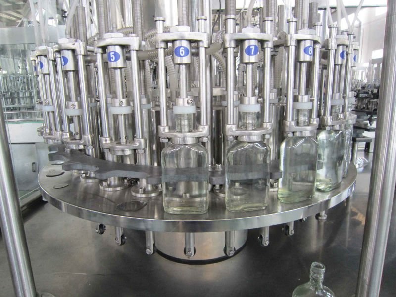 Wholesale Negative pressure glass wine bottling plants / wine filling machine / wine bottle filler from china suppliers
