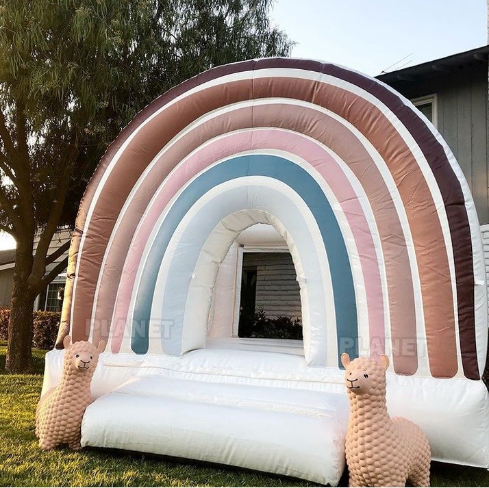 Wholesale PVC tarpaulin outdoor party rental Inflatable Rainbow bouncer with slide kids combo bounce house from china suppliers