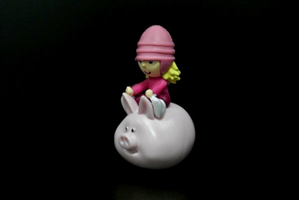 One Inch Height Plastic Toy Figures A Girl With Pinky Hat On A Pig As Tumbler
