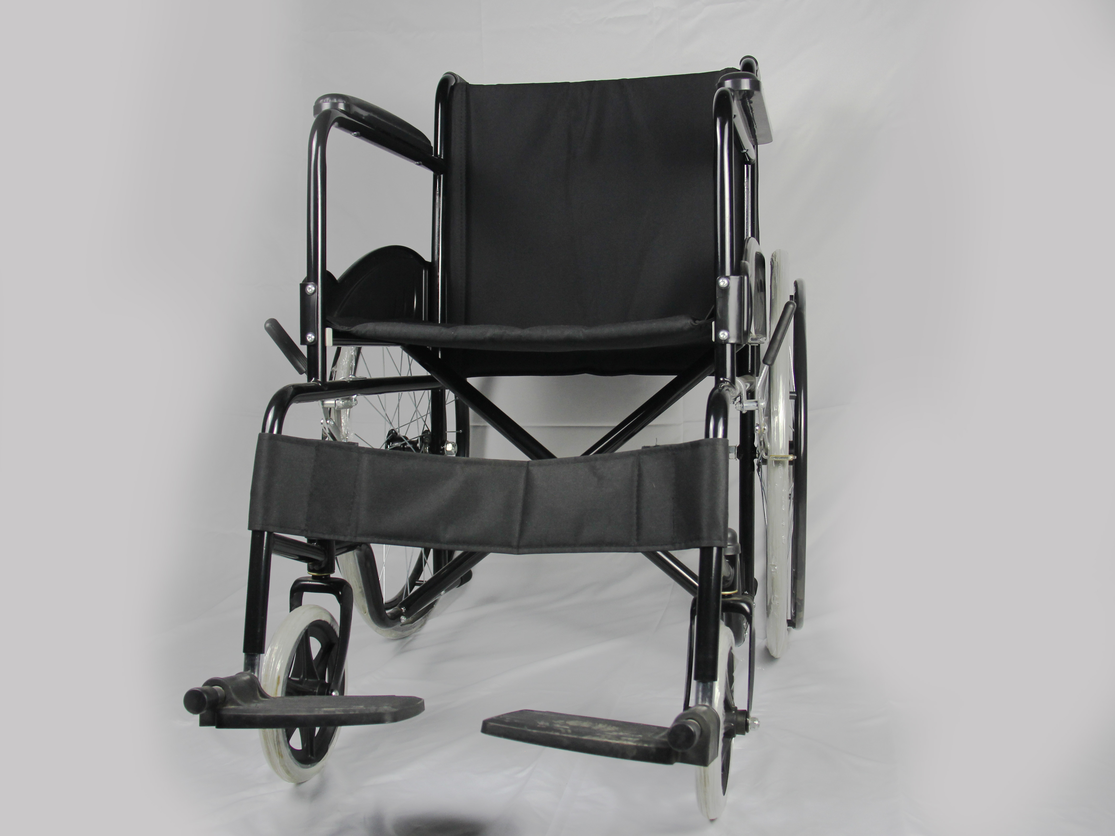 Powder Coating Folding Steel Wheelchair With Solid Wheel