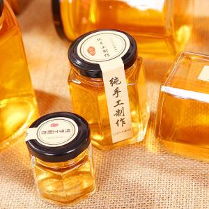 Wholesale Hexagon Clear Glass Storage Bottle 100ml 500ml With Metal Lid For Honey Cream from china suppliers