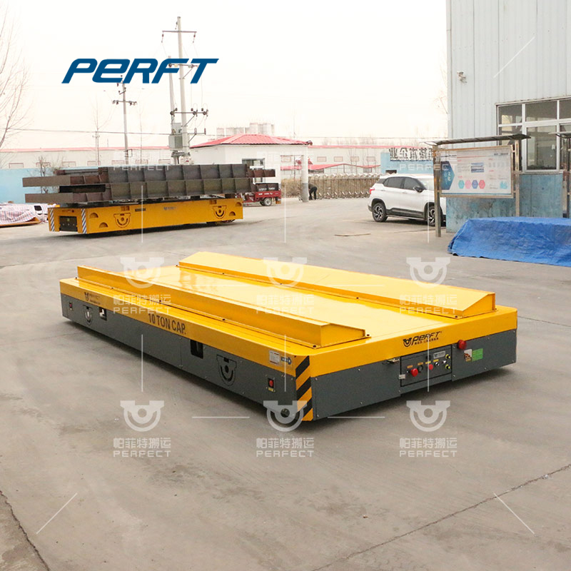 10t battery powered steerable trackless transfer car running on the cement floor with remote control