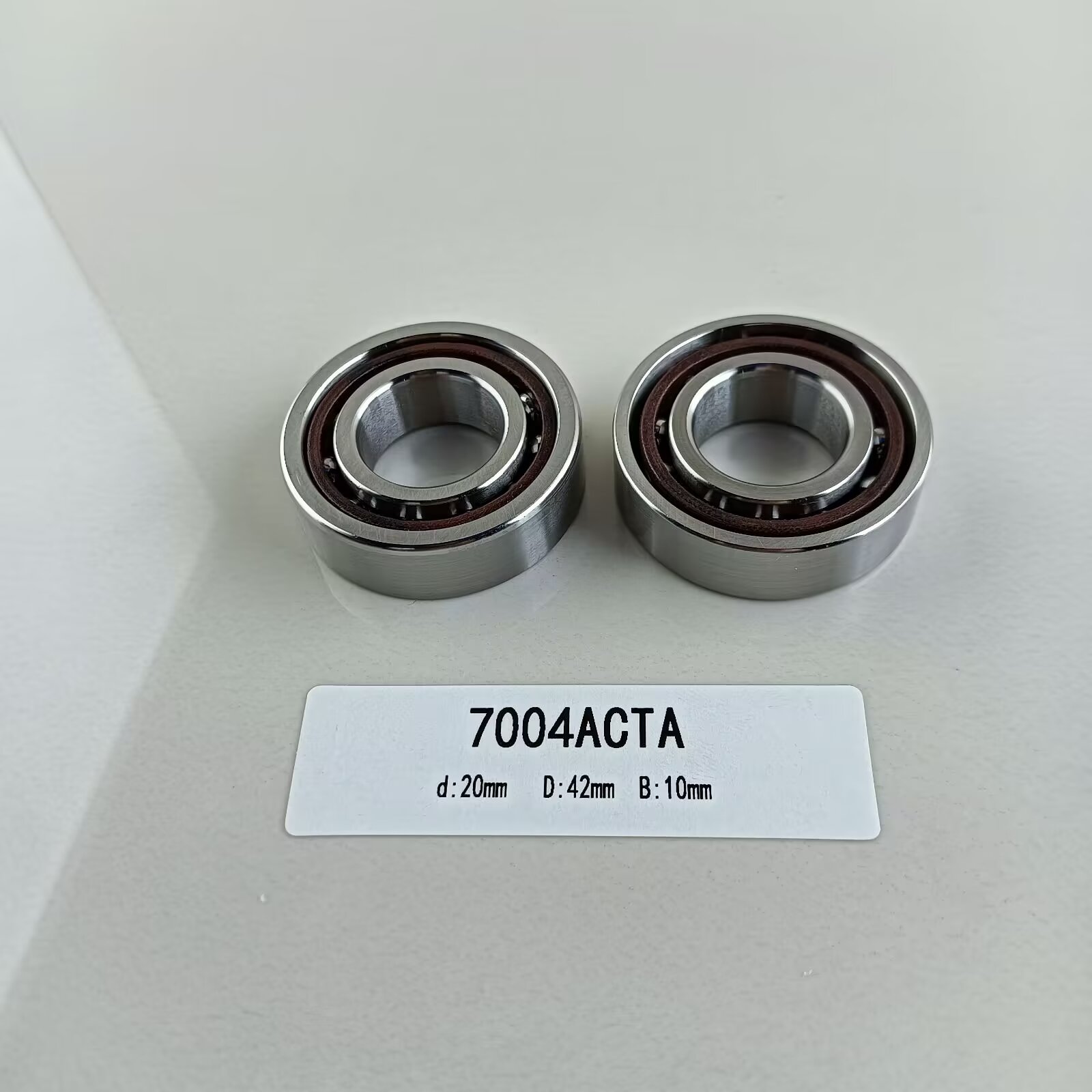 Single Row 20*42*12mm Angular Contact Ball Bearing 7004AC for Radial Load Direction