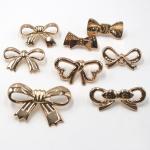 ODM Handbag Metal Tags Durable Embossed Brass Antirust Bow Knot Shape Purse