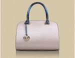 2016 new European and American fashion handbags serpentine Messenger bright skin