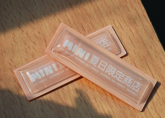 Garments 1.0mm Clear TPU Embossed Patch With White Custom Logo