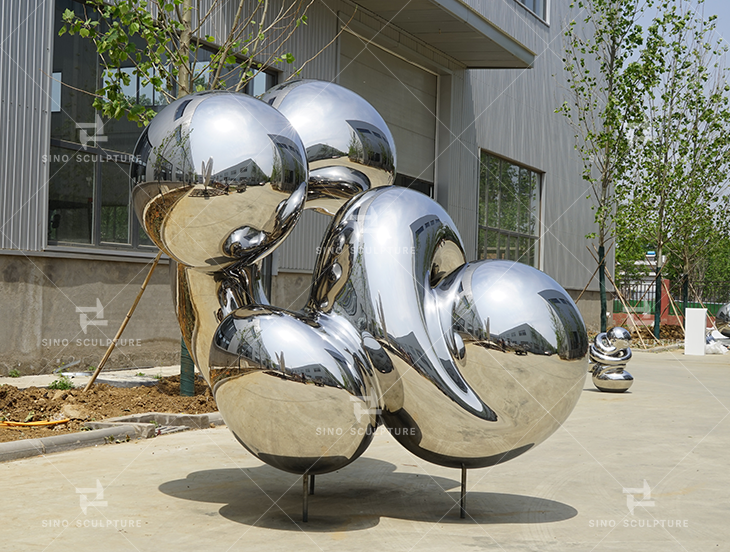 the completion of the Knot sculpture in the Sino Sculpture factory