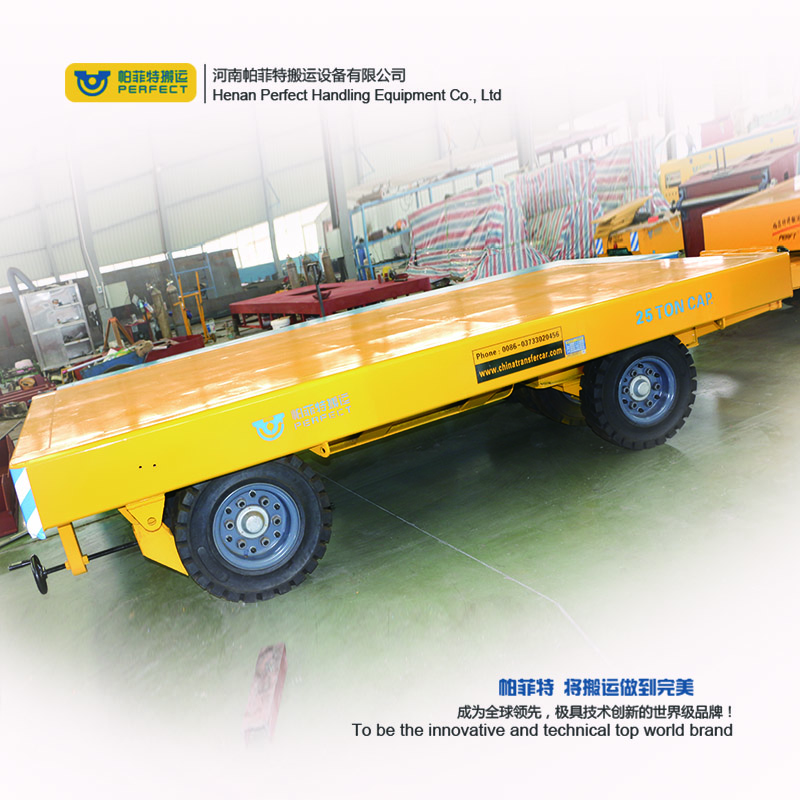 custom 1-200 ton heavy duty industrial trailer towed by forklift free turning trackless transfer trailer 