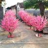 Buy cheap UVG small artificial peach blossom wooden tree wedding reception decorations from wholesalers