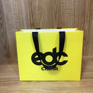 Wholesale 175gsm Lotus Color Goose Yellow Garment Paper Bags For Clothing Store from china suppliers