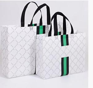 Wholesale Logo Printed Gilding Striped Apparel Paper Bag Packaging For Clothes from china suppliers