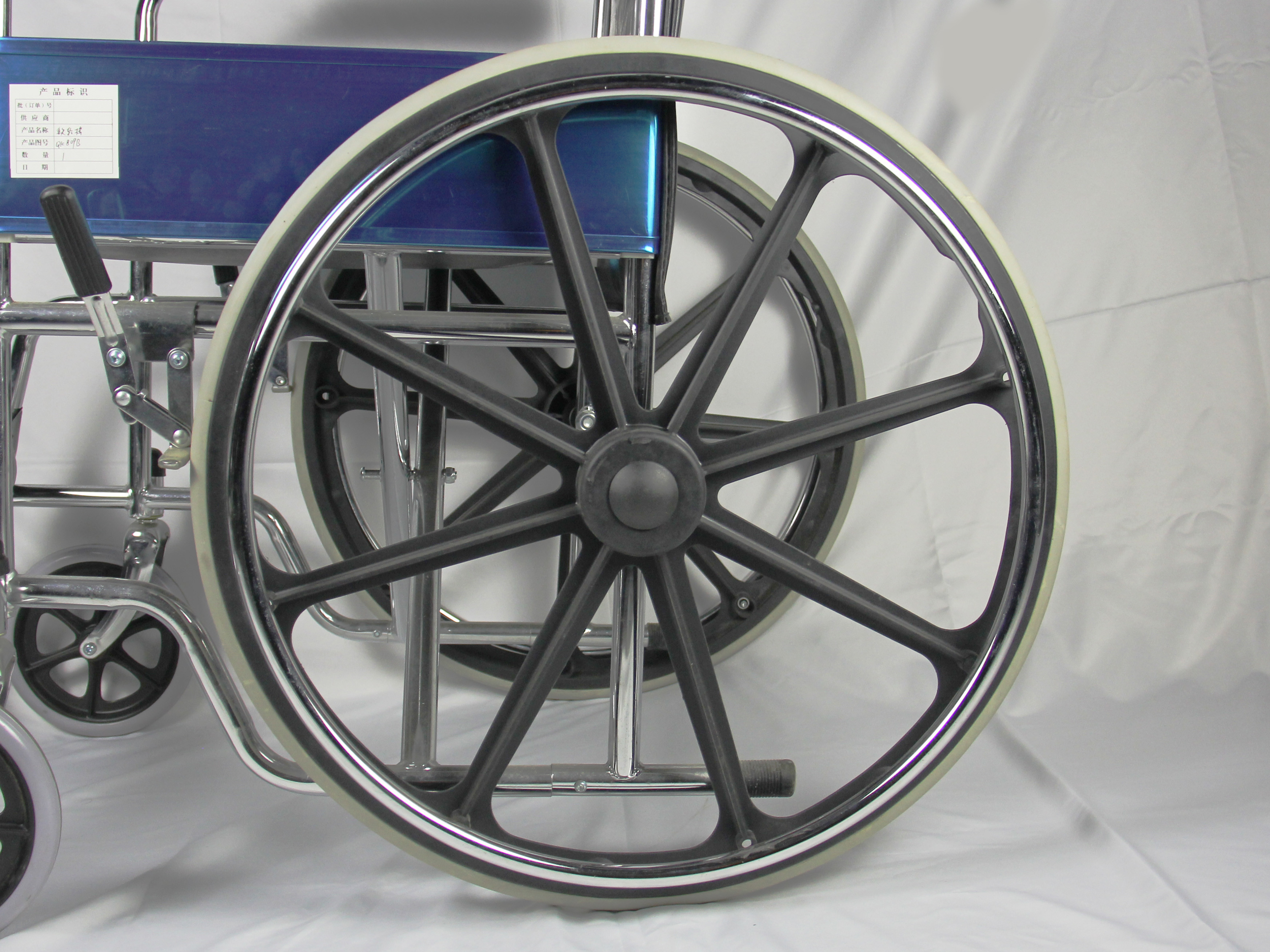 Solid Castor Folding Steel Wheelchair Fixed Armrest And Footrest