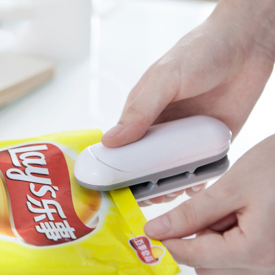 Plastic Pouch Sealing Mini Bag Sealer and Cutter for Portable Paper Packaging Material