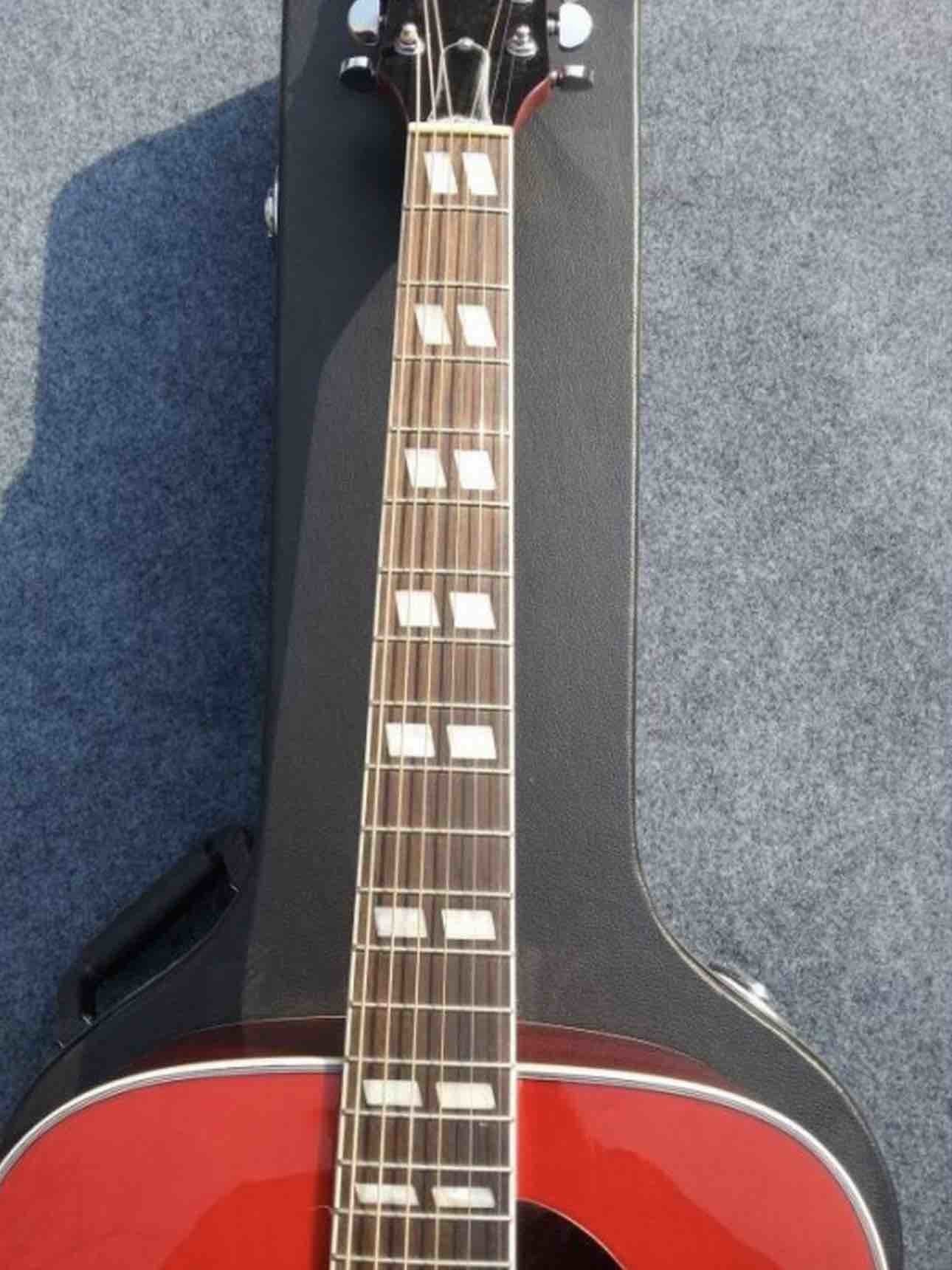 2018 Orange Sunburst Dovo acoustic guitar