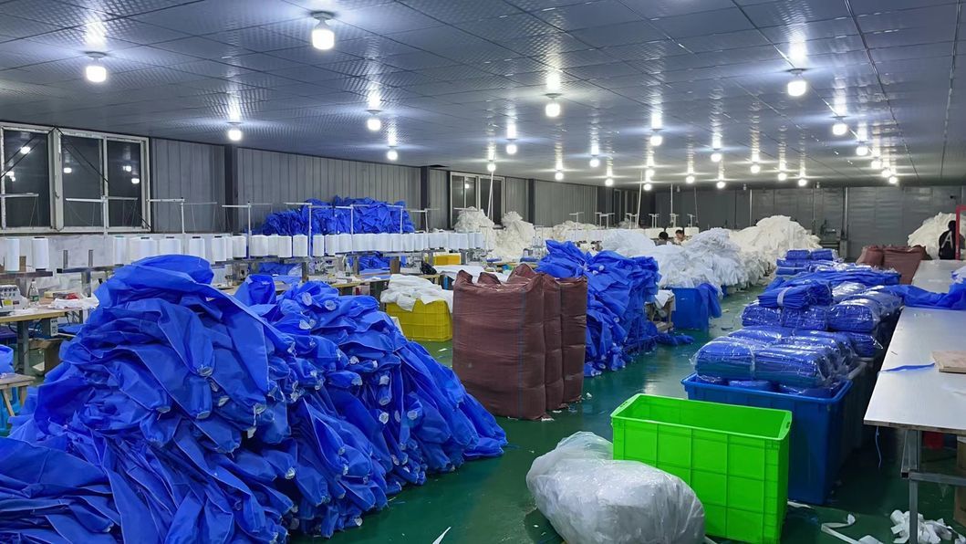 Wholesale Waterproof SMS Nonwoven Isolation Gown Soft Anti-Static Gown with Knitted Cuffs