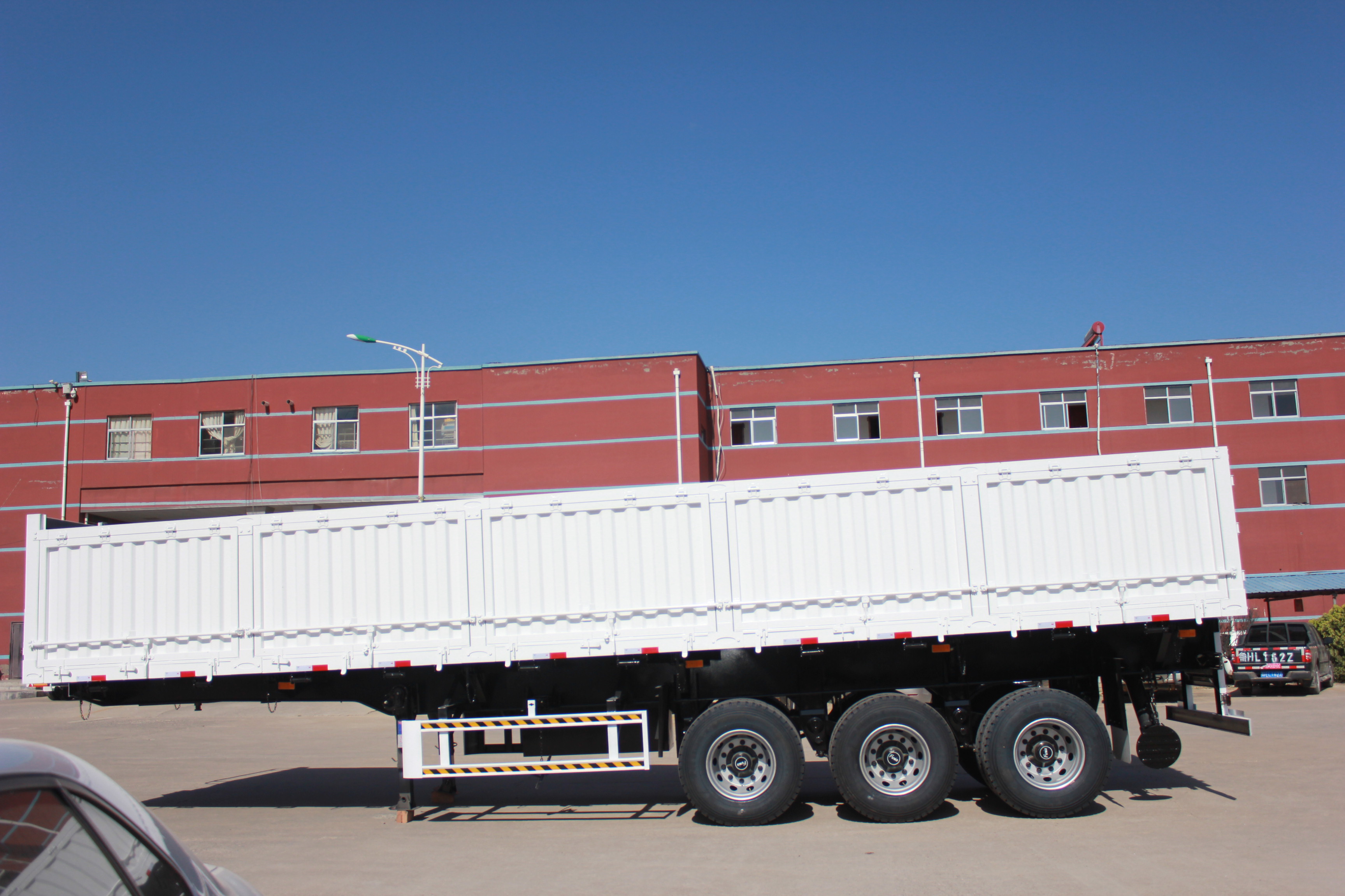 12000X2500X1500mm Tri-Axles Tipper/Side Dump Semi Trailer with HYVA Hydraulic Cylinder