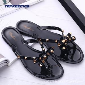Wholesale PVC Summer Black Flat Sandals Womens With Bow Rivet from china suppliers
