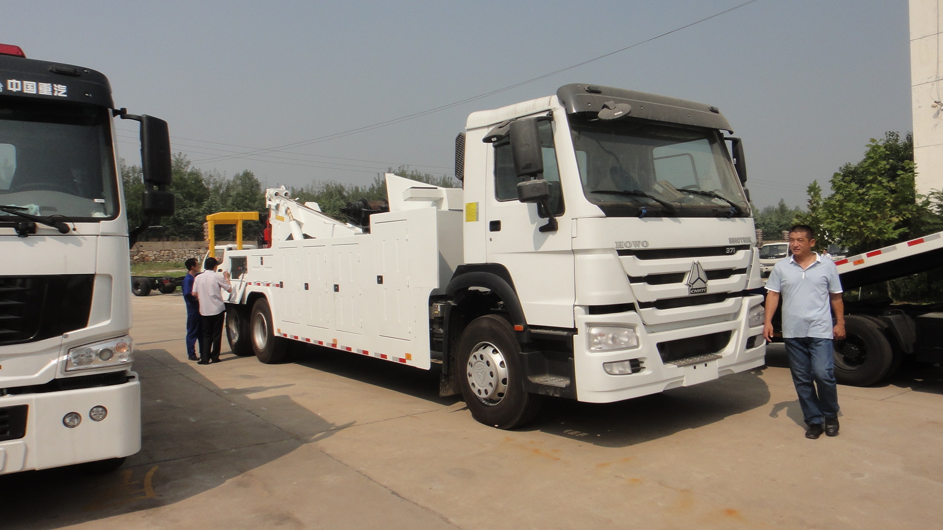 SINOTRUCK HOWO Heavy Rotator Wrecker Tow Trucks High Strength Welding Steel