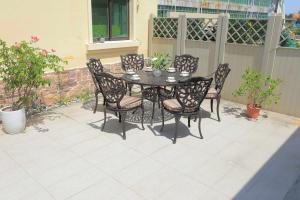 Wholesale Modern Style Fixed Rotary Outdoor Table and Chairs with Optional Rattan Color from china suppliers