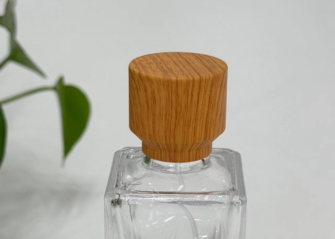 Custom Wooden Zamak Perfume Caps For Sophisticated Fragrance Packaging