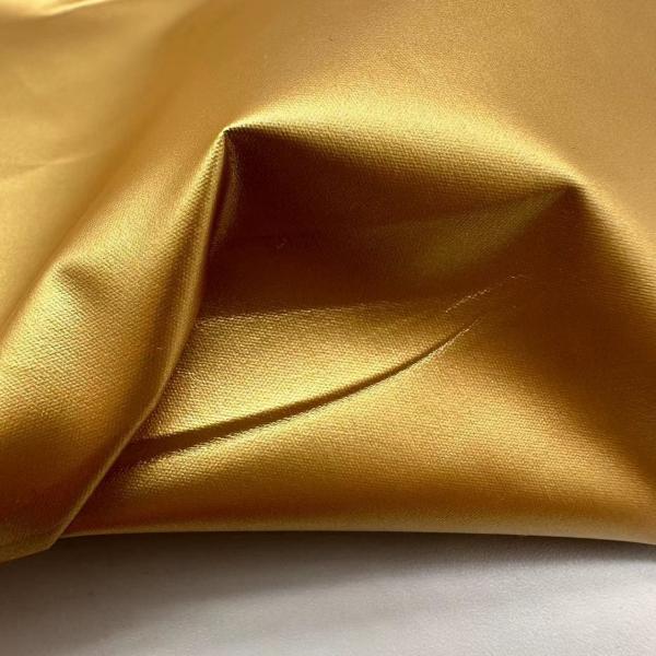 100% Polyester 104GSM Outdoor Jacket Fabric Water Resistant With Gilded Gold