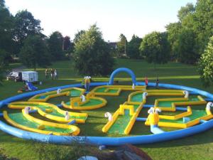 Wholesale Popular Crazy Inflatable Sports Games , Inflatable Golf Race Field For Event from china suppliers