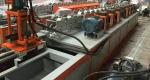 Garage door slat forming machine