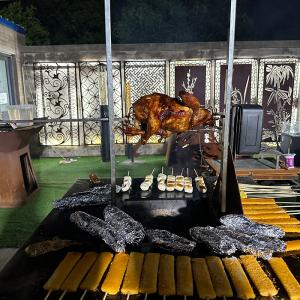 Wholesale Heavy Duty Red Rusty Corten Steel BBQ Grill With Automatic Ratating Chicken Rack from china suppliers