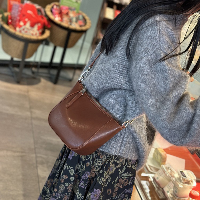 Upgrade Your Wardrobe with 2024 Spring's Flocked Cowhide Bag Versatile and Timeless