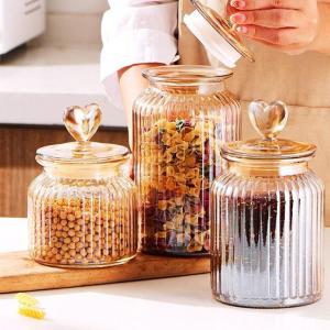 Wholesale Heart shaped lid, glass jar, sealed jar, colored storage jar, household flower tea storage, candy and snack jar from china suppliers