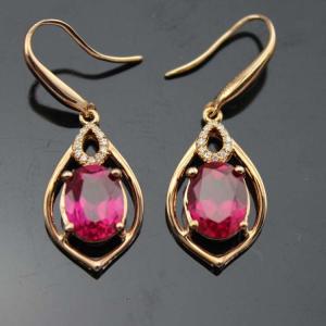 Wholesale Rose Gold 925 Silver 7mmx9mm Oval Ruby Cubic Zirconia Dangle Drop Earrings (PSJ04225) from china suppliers