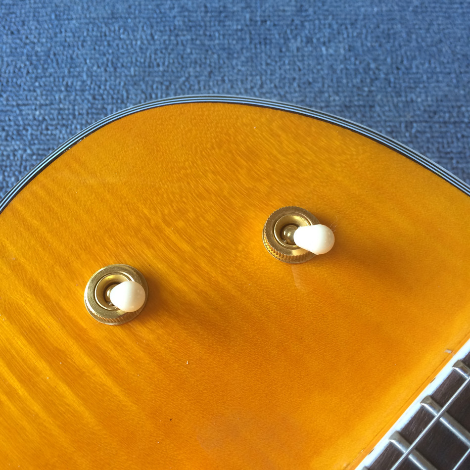 New style high-quality hollow body jazz electric guitar, Double F holes,Tremolo system ,Flame Maple top