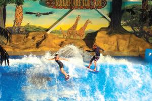 Wholesale Enjoying Flowrider Water Ride , Surfing Attractive Wave Skid Board / Aqua Park Amusement from china suppliers