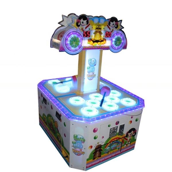 Dreamland indoor game center double players hitting mouse arcade machine for