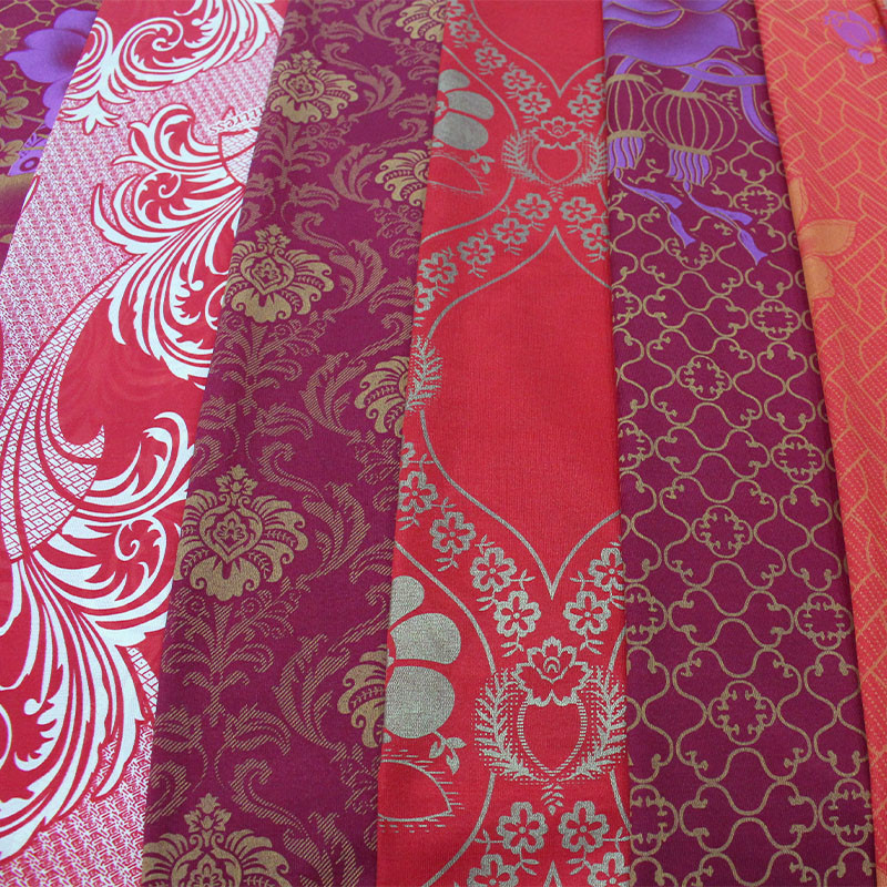 The factory directly supplies 100% polyester warp knitted printed mattress fabric, gold powder printed cloth