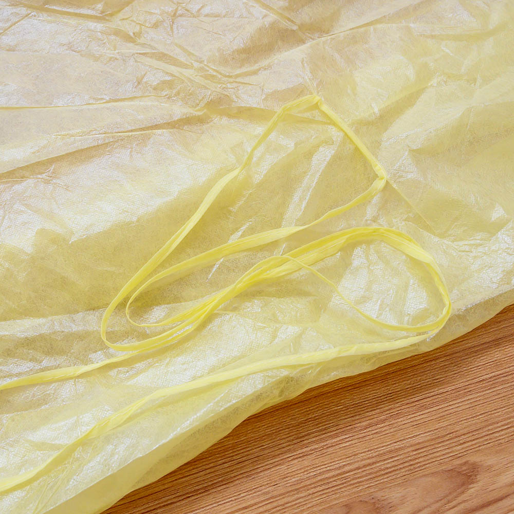 Disposable Pp Pe Coated Waterproof Non Woven Isolation Gowns Yellow Color