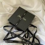 Golden Black Holiday Packaging Box With Ribbon