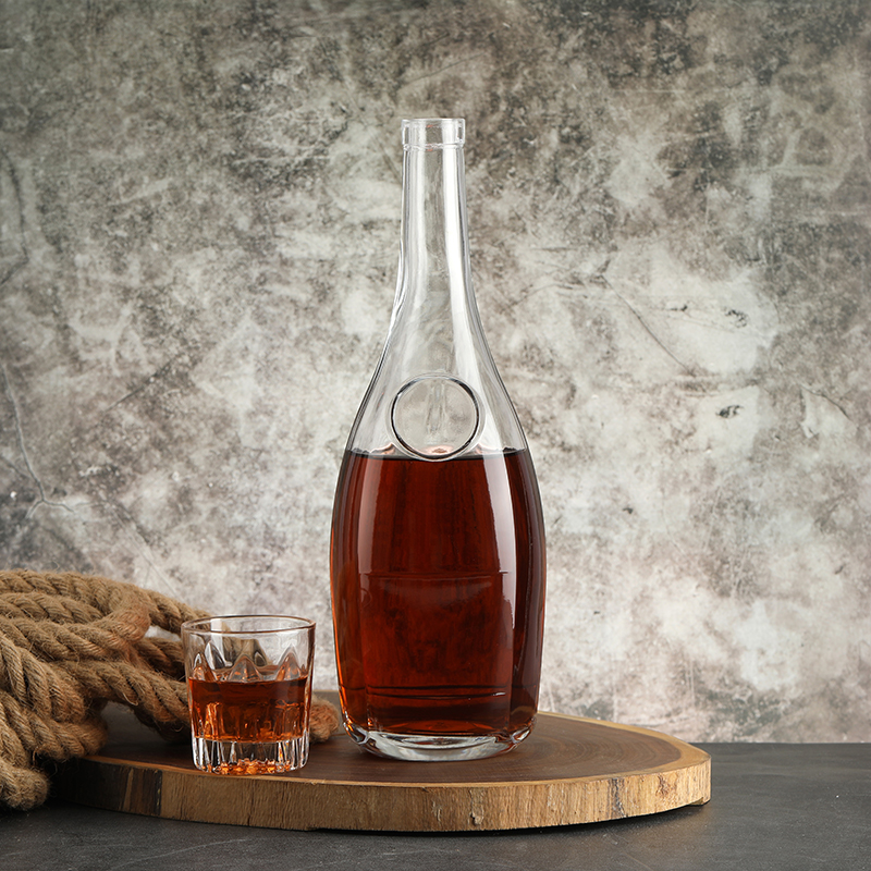 Aluminum Plastic PP Collar Material 500 ml Transparent Customized Embossed Liquor Bottle
