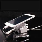 COMER anti-theft locking devices cellular telephones security holders alarm