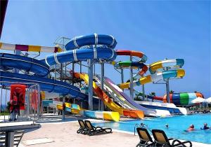 China OEM Water Park Slide Amusement Park Rides Facilities Playground Swim Game Pool Kid Water Slide on sale
