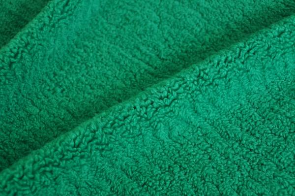 Green High-Quality Textile Material, Showcasing the Perfect Blend of Fashion and