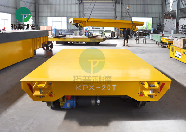 Workshop handling equipment has rail battery transfer cart for molds