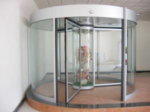 Wholesale Commercial Three wing automatic revolving door 150KG with central showcase from china suppliers