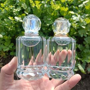 Wholesale Crystal White Glass Perfume Bottle 100ml Vertical Stripe Cylindrical Bayonet from china suppliers
