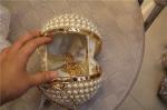 Round high-grade pearls evening bags woman holding a high-end fashion evening