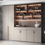 The Wine Cabinet With Khaki Door Panels Contains Yellow Led Lights