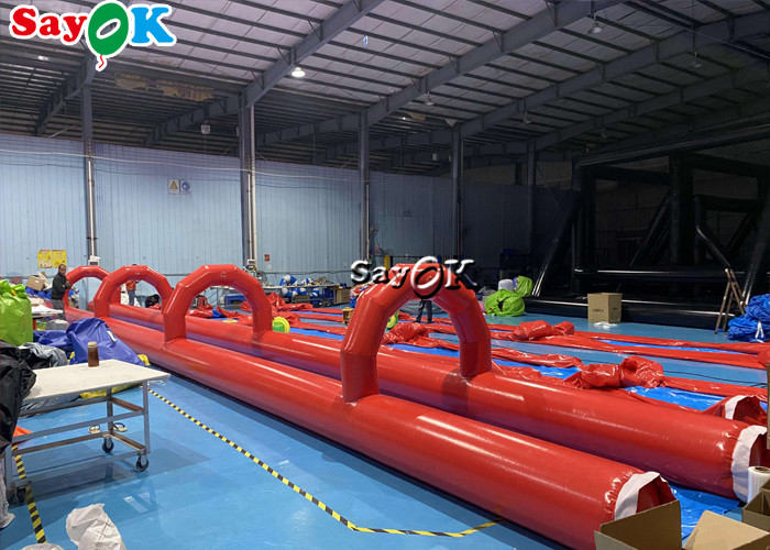 Outdoors Water Inflatable Slides PVC Tarpaulin Inflatable Water Slide Tiled On Flat Ground 60x2m