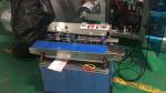 China Manufacturer Supermarket Plastic Bag Tape Neck Sealer Machine