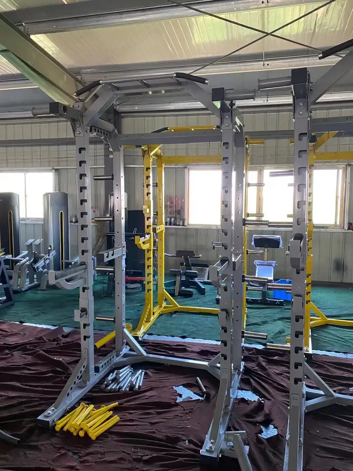 Multifunctional Strength Training Equipment Half Cage Bench Press Smith Machine Power Rack with Dumbbell Back Extension Function