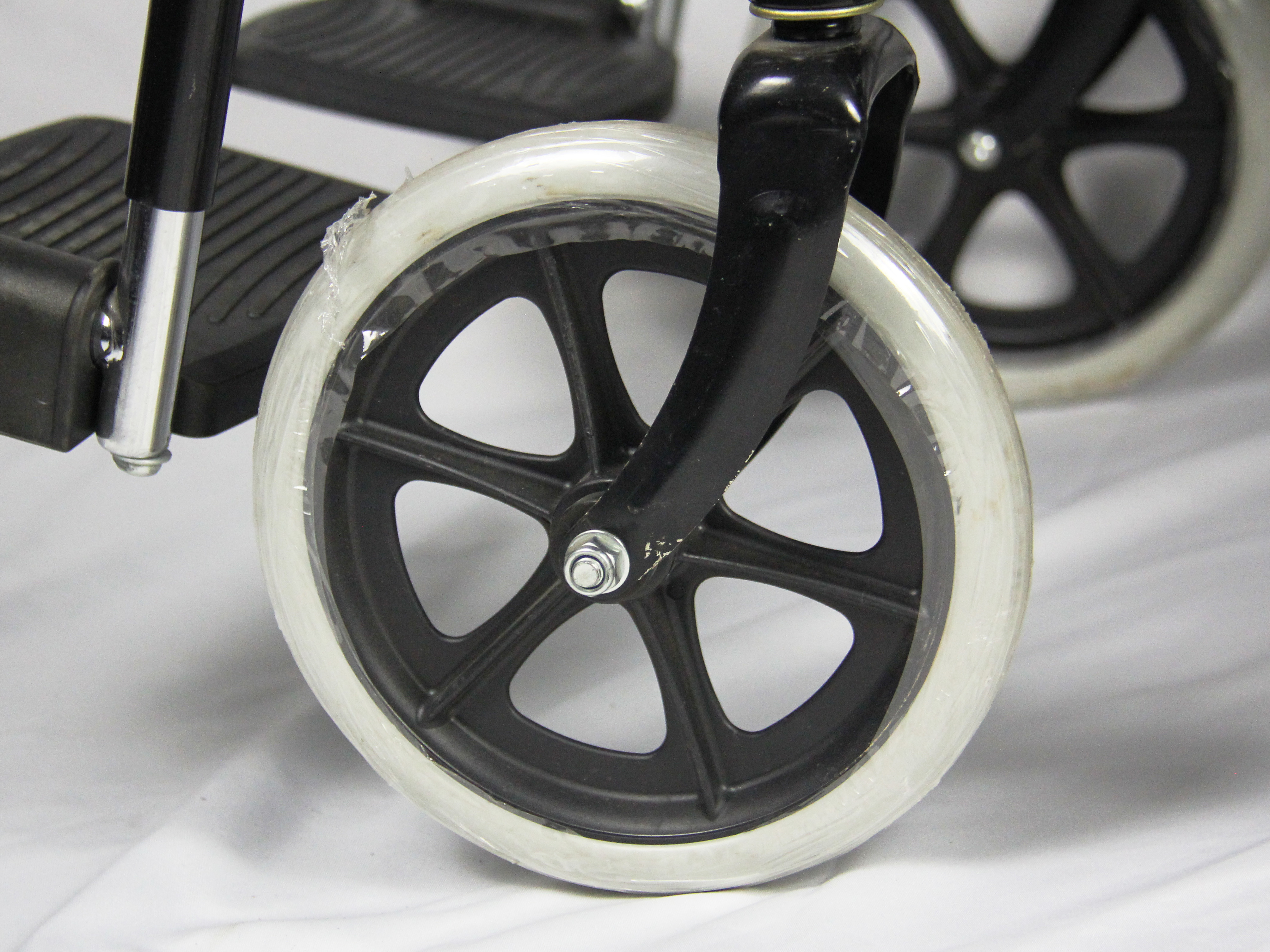 Powder Coating Folding Steel Wheelchair With Solid Wheel